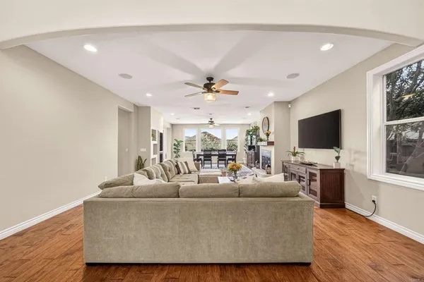 a view of a livingroom with furniture and a fireplace