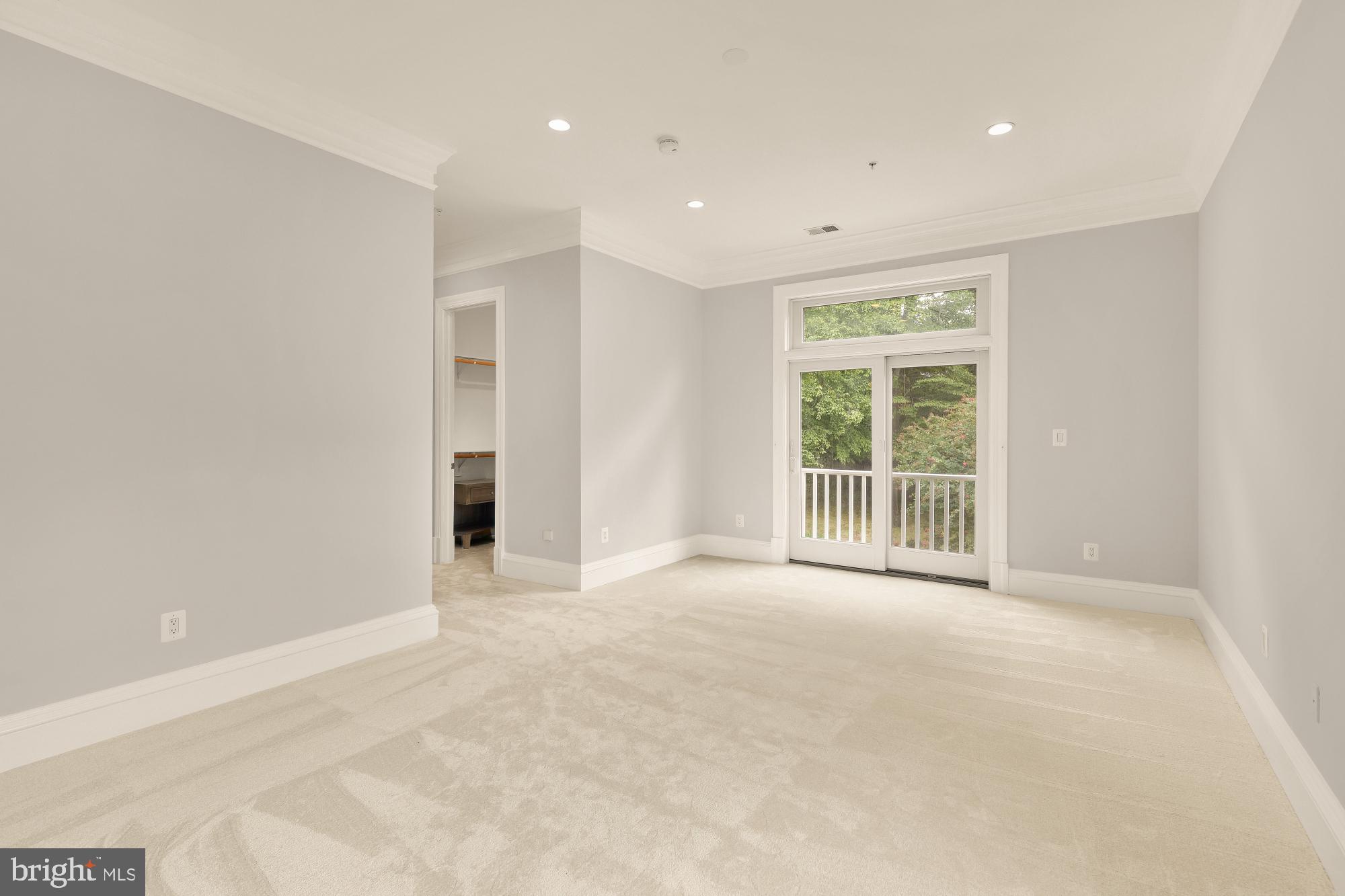 8505 Howell Road Bethesda, MD 20817 - Photo 41 of 75 Ensuite 3 (22'2 x 19'7 ) floor to ceiling windows