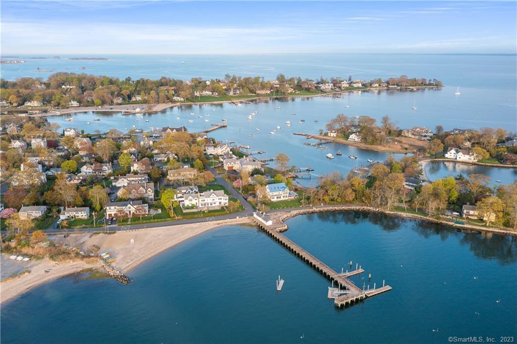 10 Plymouth Road Darien, CT 06820 - Photo 2 of 13 an aerial view of residential houses with outdoor space and lake view