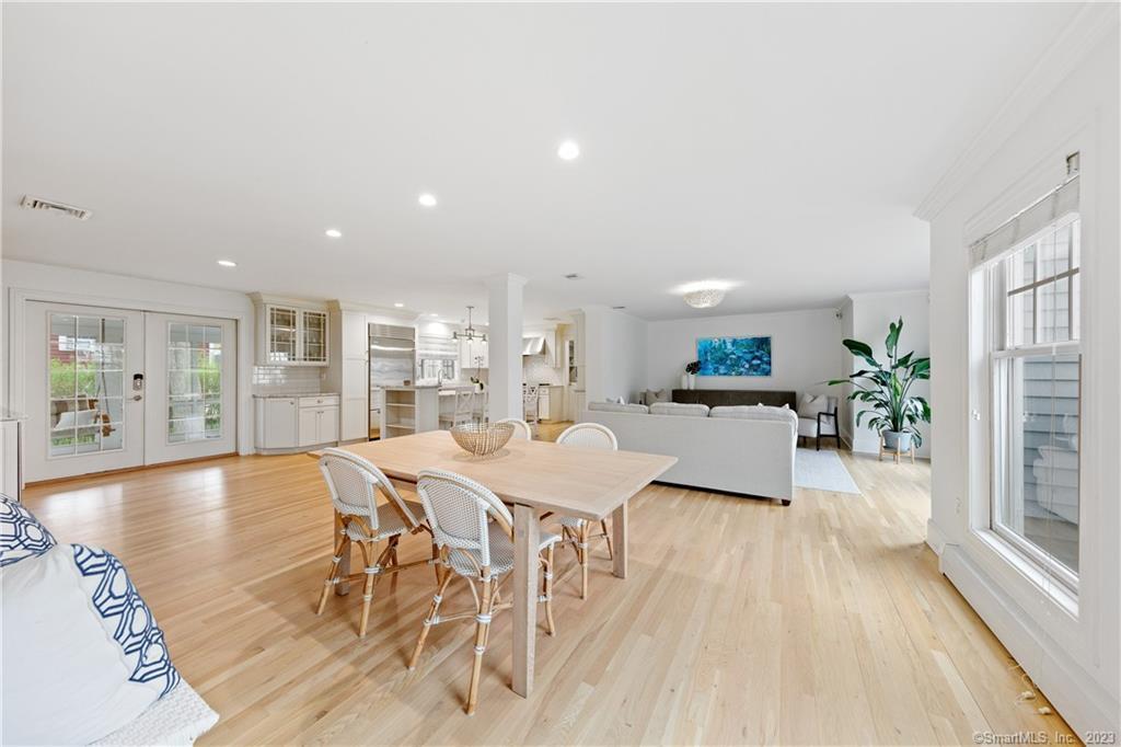 10 Plymouth Road Darien, CT 06820 - Photo 7 of 13 a dining room with furniture and wooden floor
