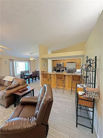 a living room with furniture and a table