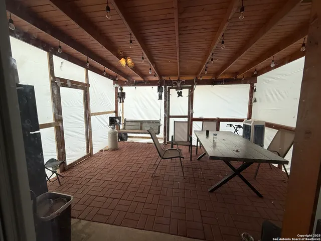 a living room with chairs