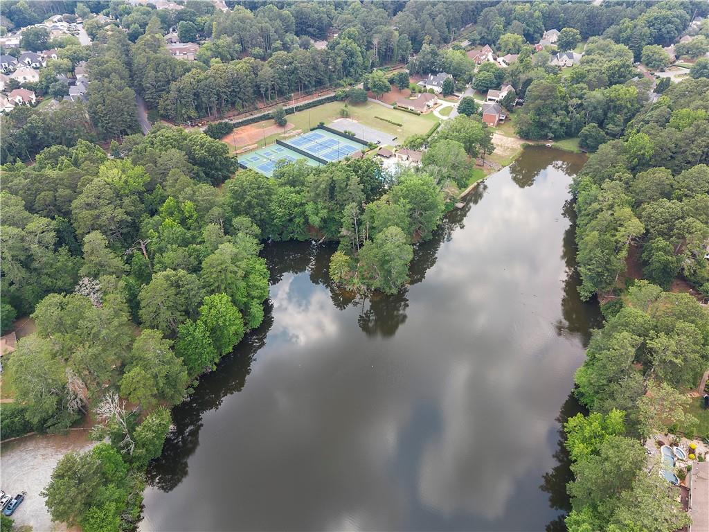 8965 Laurel Way Alpharetta, GA 30022 - Photo 63 of 79 an aerial view of a house with a yard and lake view