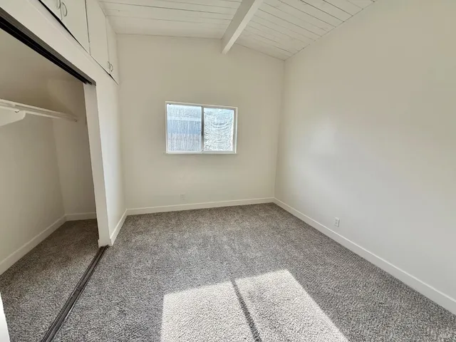 a bathroom with a sink toilet and mirror