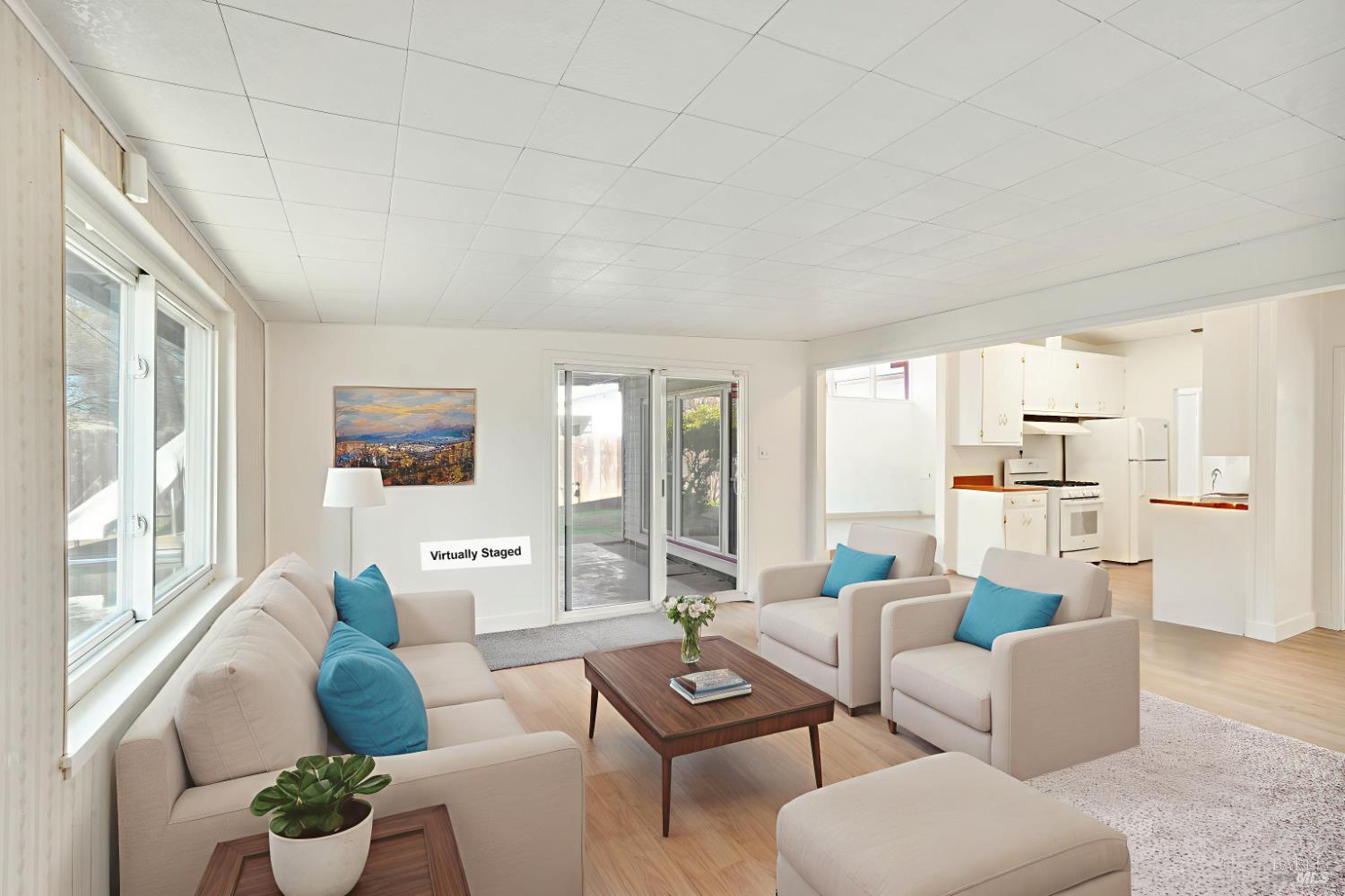 240 South 7th Street Dixon, CA 95620 - Photo 18 of 61 a living room with furniture and a large window