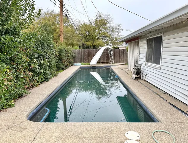 a view of a golf course with a lake