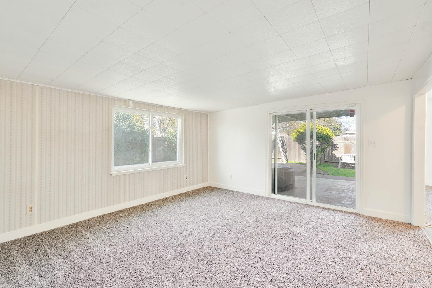 240 South 7th Street Dixon, CA 95620 - Photo 19 of 61 an empty room with windows