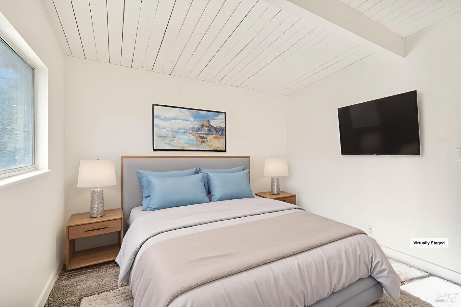 240 South 7th Street Dixon, CA 95620 - Photo 26 of 61 a bedroom with a bed and a flat screen tv