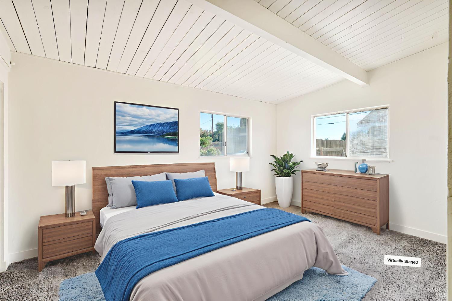 240 South 7th Street Dixon, CA 95620 - Photo 37 of 61 a bedroom with a bed and a painting on the wall