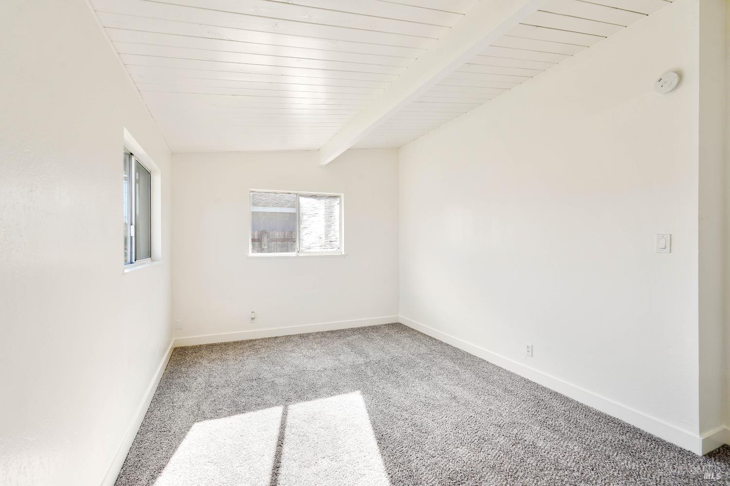 240 South 7th Street Dixon, CA 95620 - Photo 38 of 61 an empty room with a window