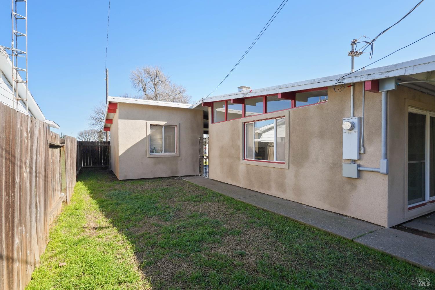 240 South 7th Street Dixon, CA 95620 - Photo 49 of 61 a front view of a house with a yard
