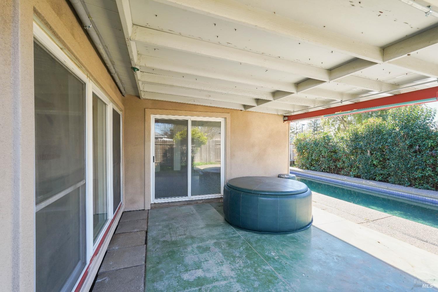 240 South 7th Street Dixon, CA 95620 - Photo 51 of 61 a large room with wooden floor and outdoor view