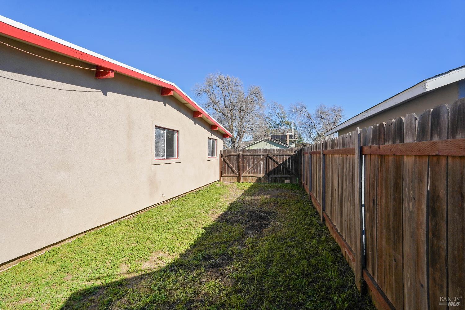 240 South 7th Street Dixon, CA 95620 - Photo 60 of 61 a view of a backyard with wooden fence