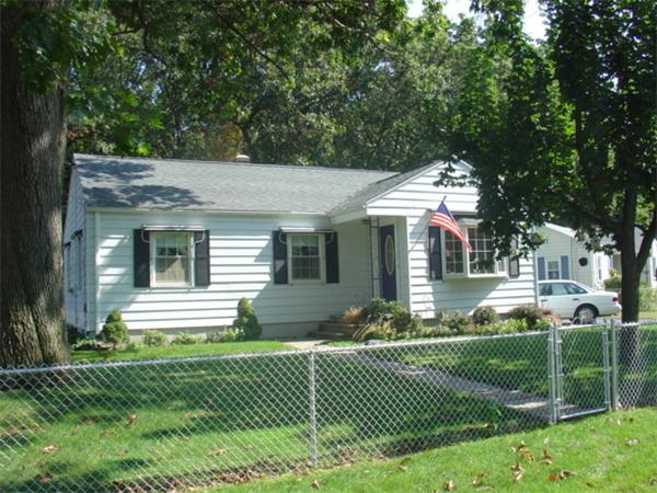 44 Duffy Lane Springfield, MA 01119 - Photo 1 of 16 a front view of a house with a yard