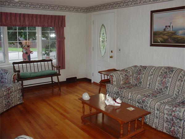 44 Duffy Lane Springfield, MA 01119 - Photo 3 of 16 a living room with furniture and a large window
