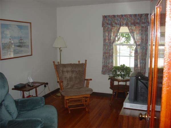 44 Duffy Lane Springfield, MA 01119 - Photo 6 of 16 a living room with furniture and a window
