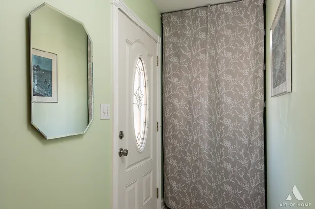 a bathroom with a granite countertop shower and a sink