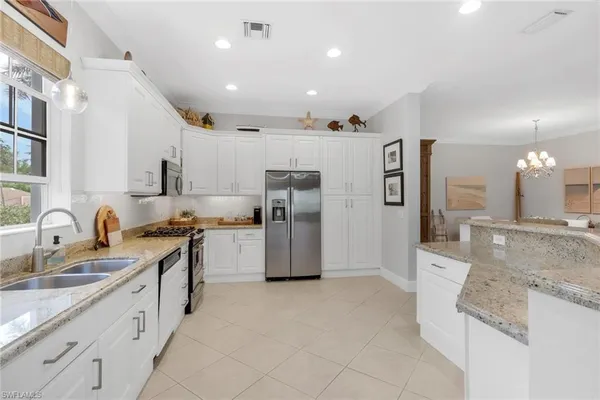 $749,000 | 9097 Cherry Oaks Trail, Unit 202, Naples, FL 34114