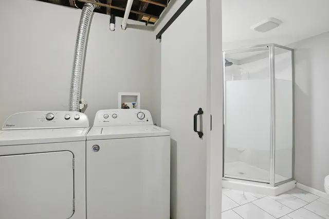 a view of a hallway to rooms