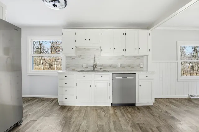 a view of an empty room and window