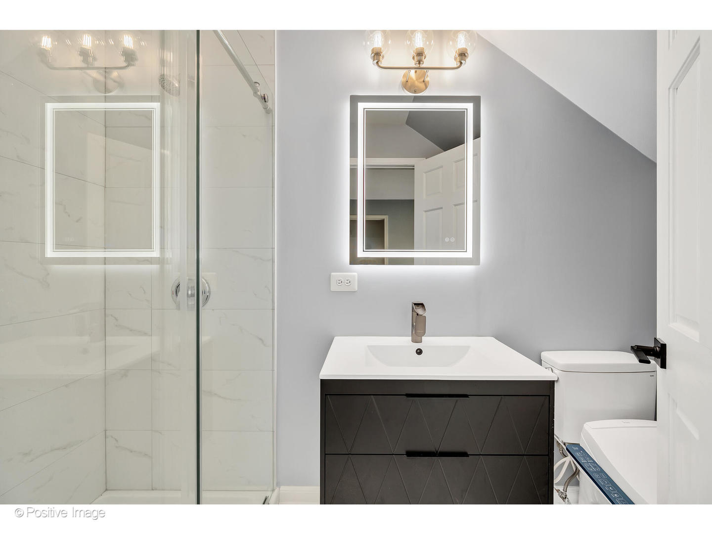 1103 Compass Court Naperville, IL 60540 - Photo 16 of 19 a bathroom with a sink and a mirror