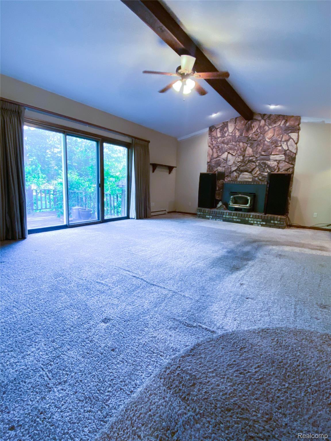 10476 Horton Road Goodrich, MI 48438 - Photo 8 of 19 Large living room walks out onto deck
