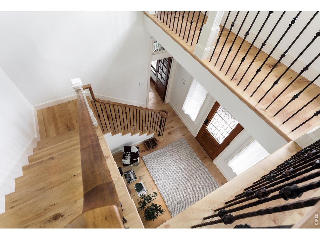 2125 11th Street Boulder, CO 80302 - Photo 33 of 48 a view of staircase with white walls and a window