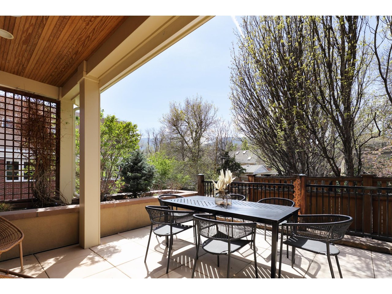 2125 11th Street Boulder, CO 80302 - Photo 40 of 48 a view of a patio with a table and chairs
