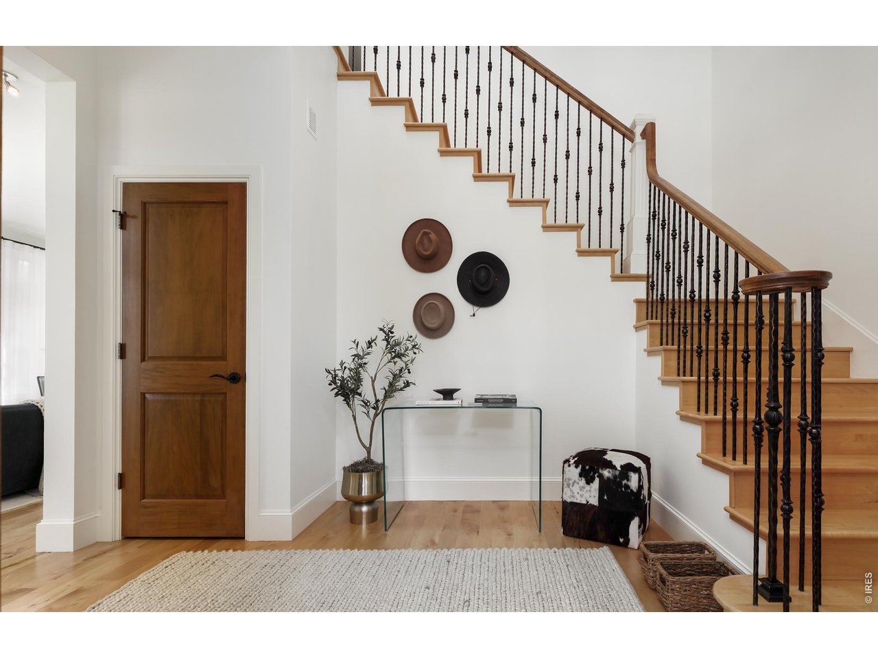 2125 11th Street Boulder, CO 80302 - Photo 5 of 48 a view of a hallway with wooden floor
