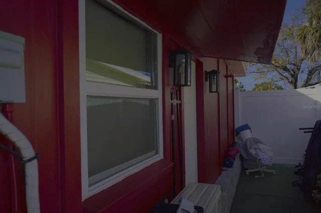 a close view of a sink and cabinets