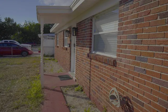 a view of a pathway besides a building