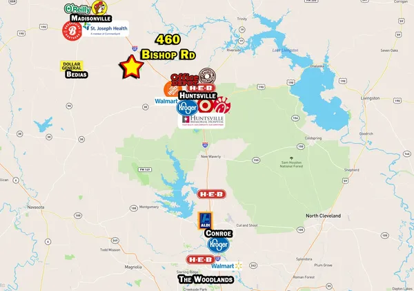 a view of a dining room with furniture a chandelier and wooden floor