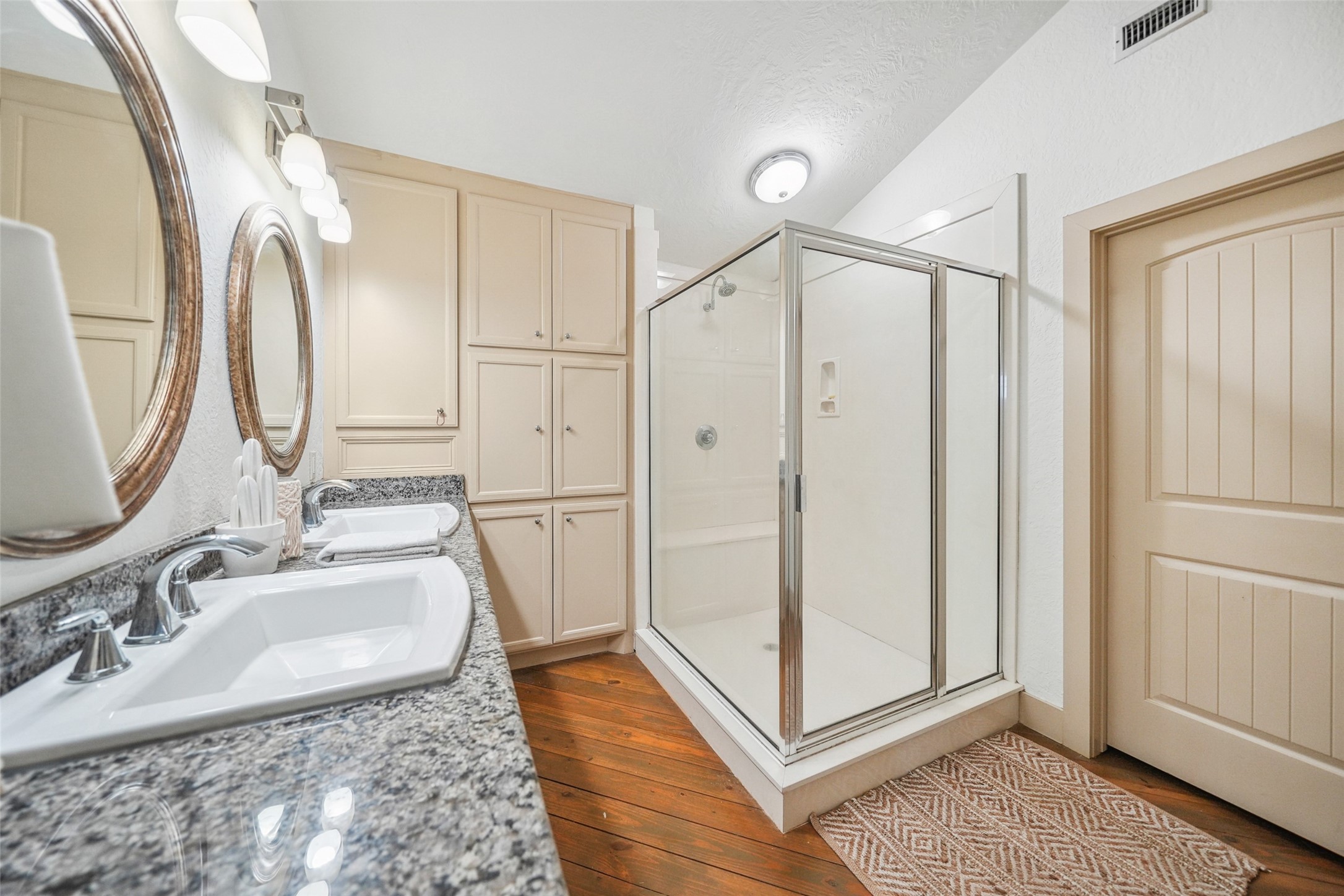 460 Bishop Road Huntsville, TX 77320 - Photo 48 of 50 A modern and elegantly designed bathroom, a sleek vanity, a spacious shower, and contemporary fixtures for a spa-like experience.