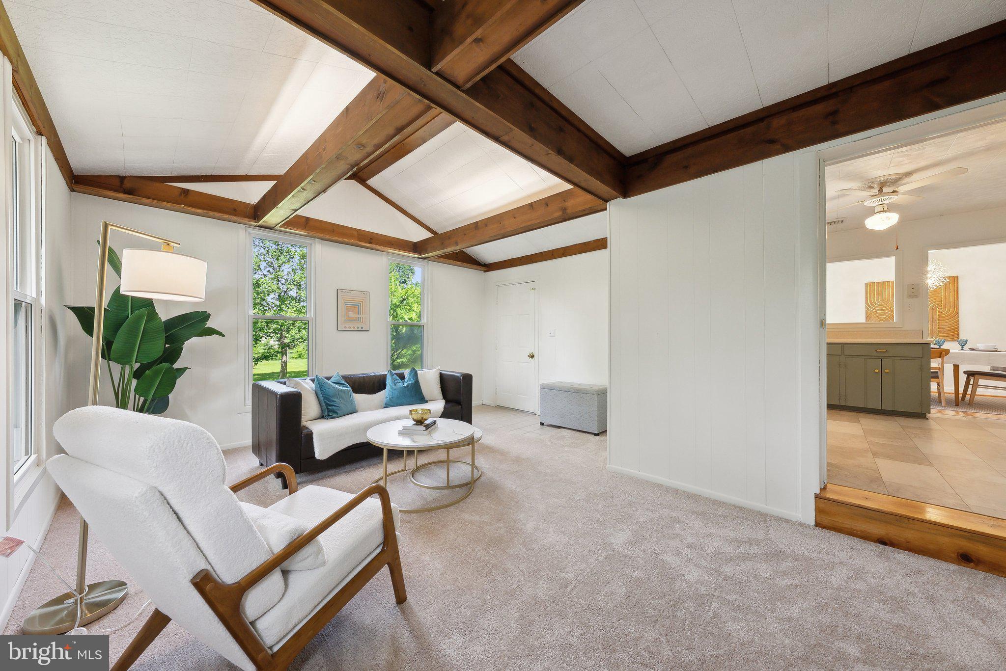 6530 Greenleaf Street Springfield, VA 22150 - Photo 13 of 26 a living room with furniture and a large window