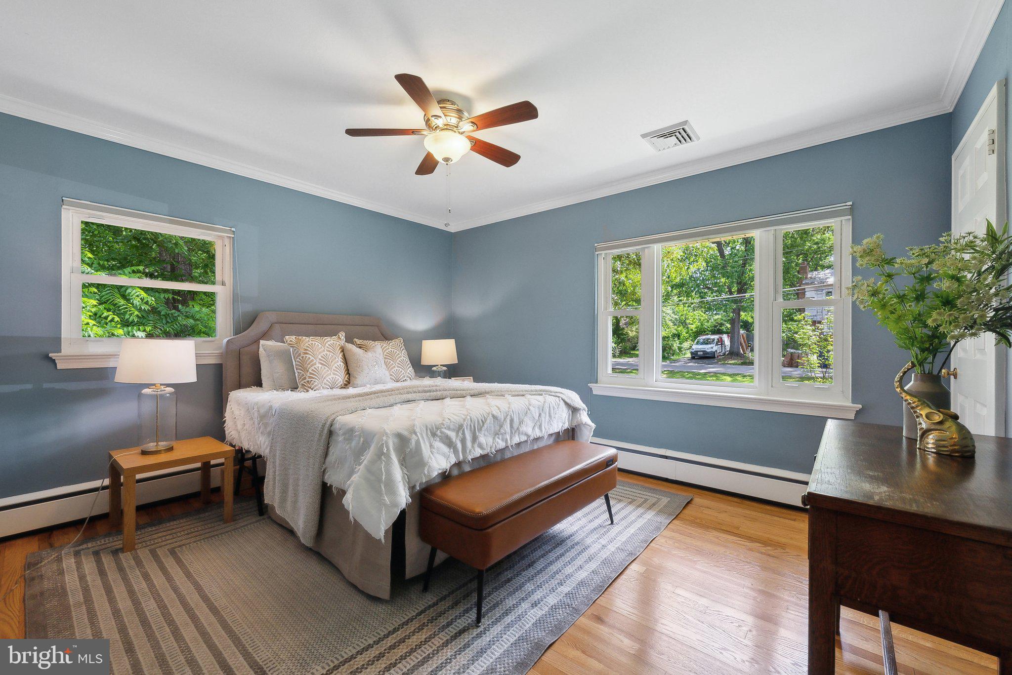 6530 Greenleaf Street Springfield, VA 22150 - Photo 14 of 26 a bedroom with a large bed and a window