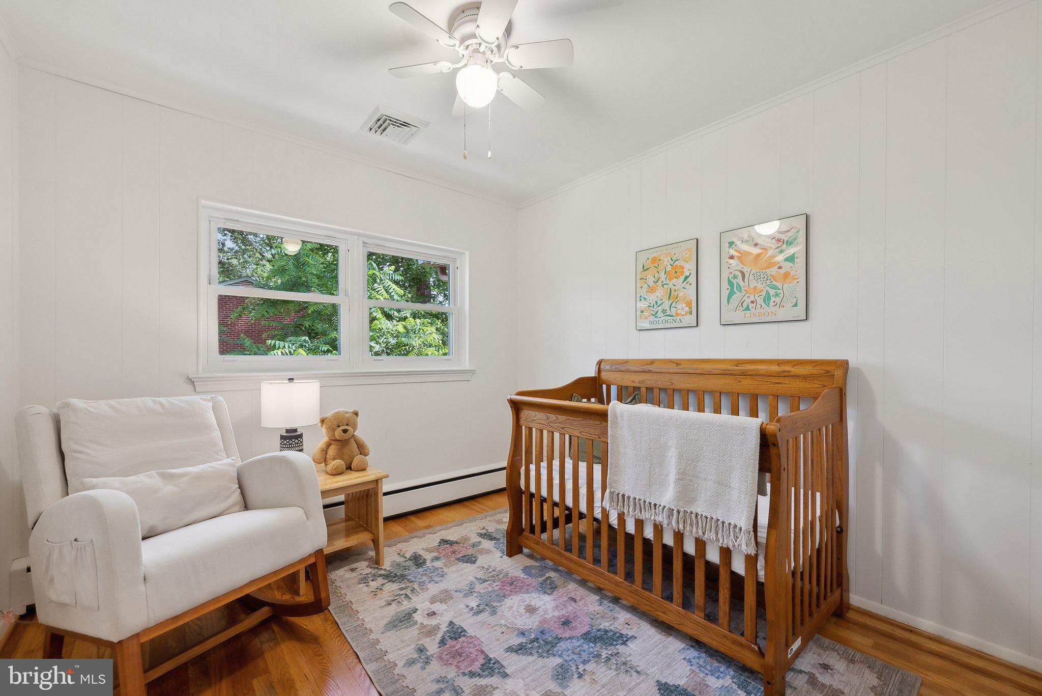 6530 Greenleaf Street Springfield, VA 22150 - Photo 16 of 26 a bedroom with furniture and a window