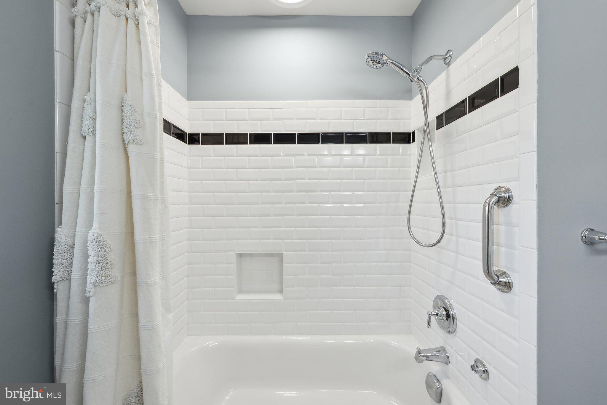 6530 Greenleaf Street Springfield, VA 22150 - Photo 18 of 26 a bathroom with a shower