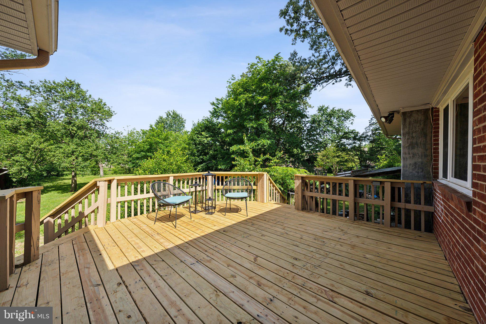 6530 Greenleaf Street Springfield, VA 22150 - Photo 4 of 26 a view of balcony with wooden floor and fence