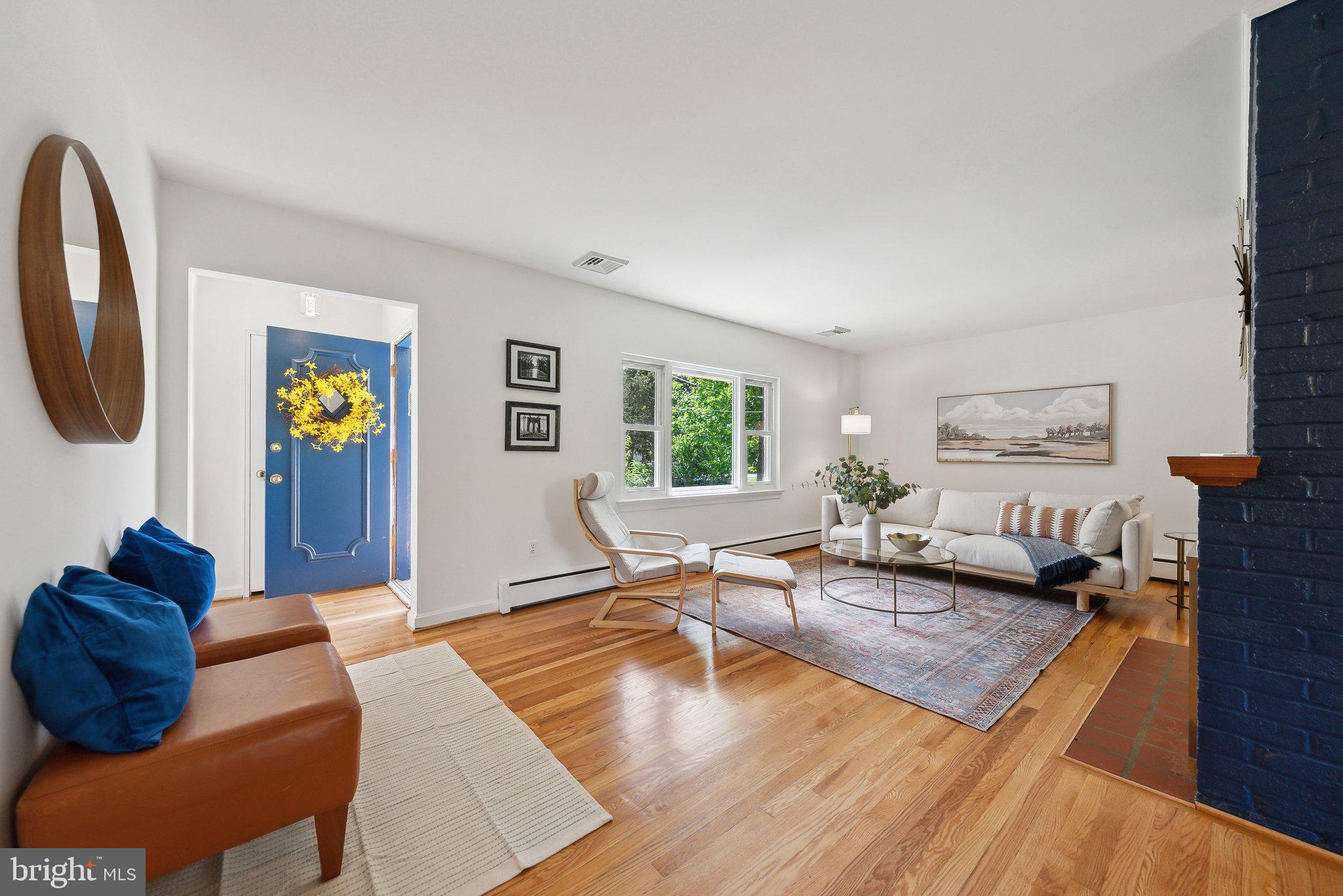 6530 Greenleaf Street Springfield, VA 22150 - Photo 5 of 26 a living room with furniture and wooden floor