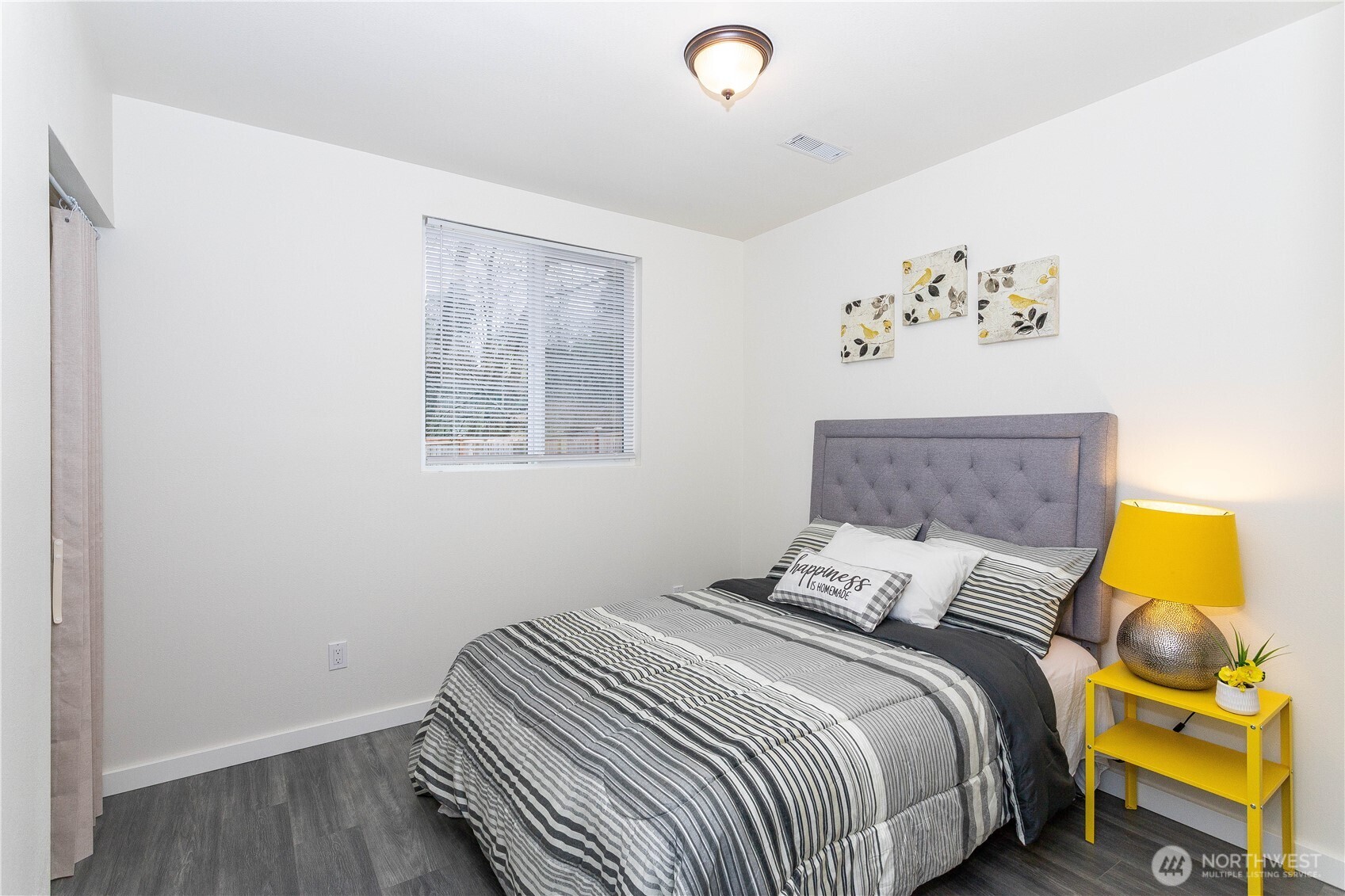 2644 Southwest 112th Street Seattle, WA 98146 - Photo 12 of 33 a bedroom with a bed and a window