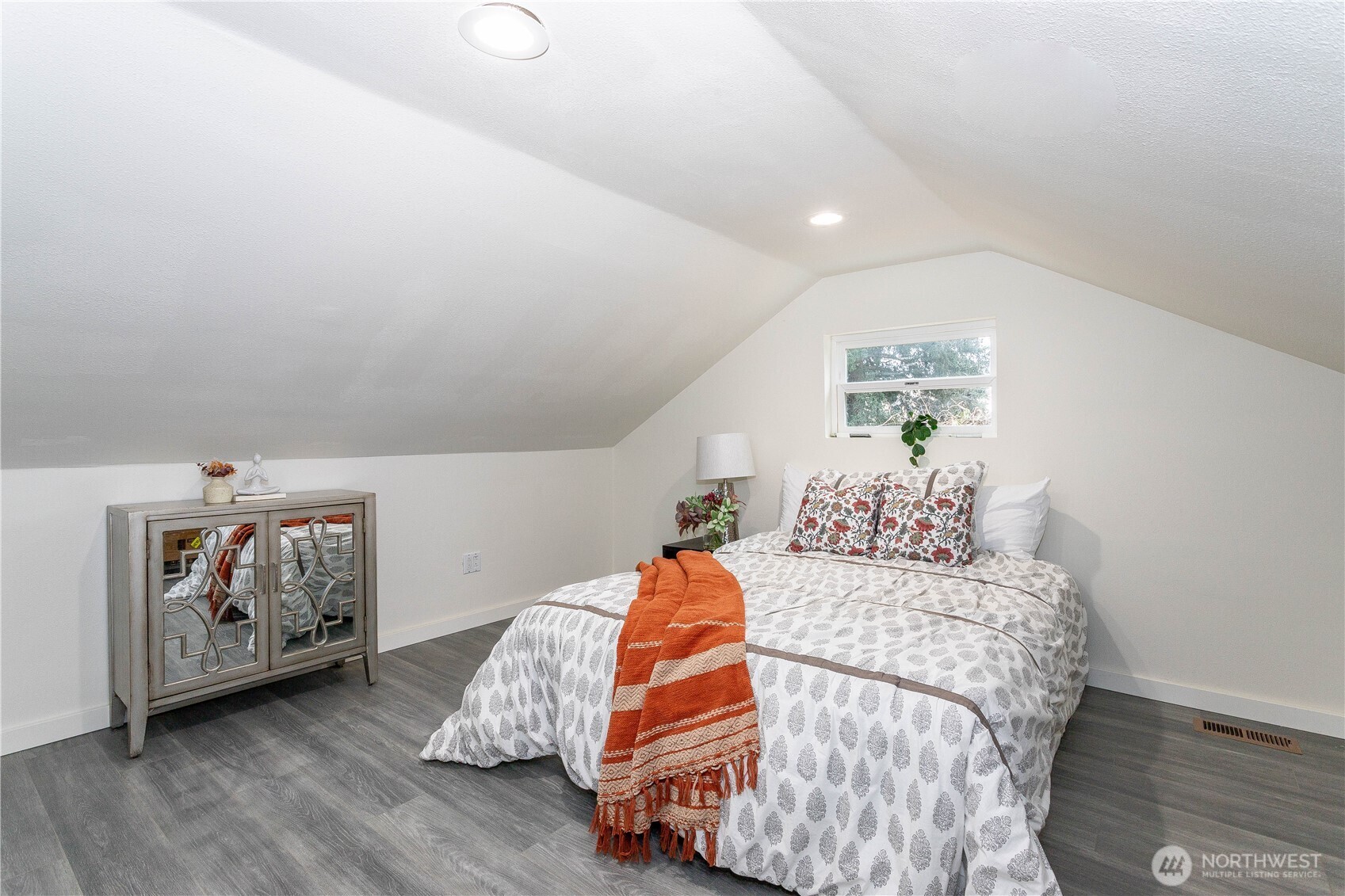 2644 Southwest 112th Street Seattle, WA 98146 - Photo 14 of 33 a bedroom with bed and wooden floor