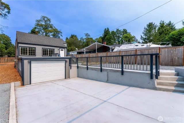 a view of a house with a garage
