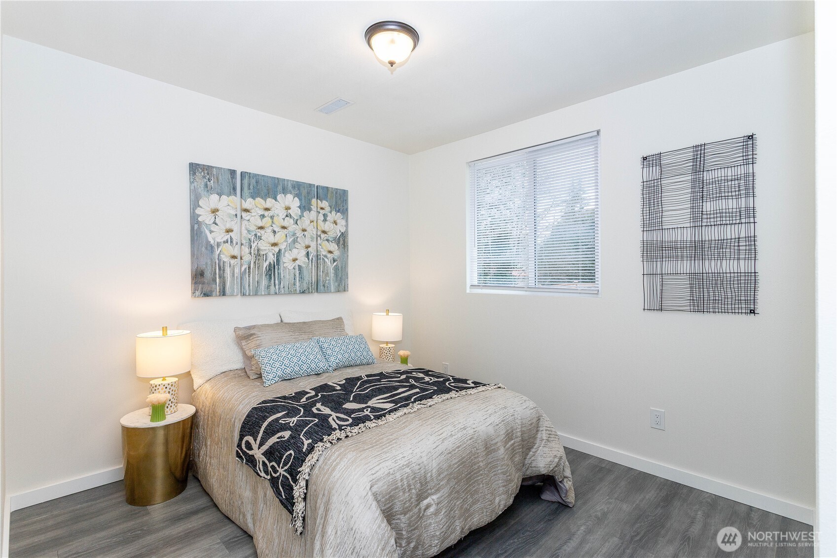 2644 Southwest 112th Street Seattle, WA 98146 - Photo 9 of 33 a bedroom with a bed and a window