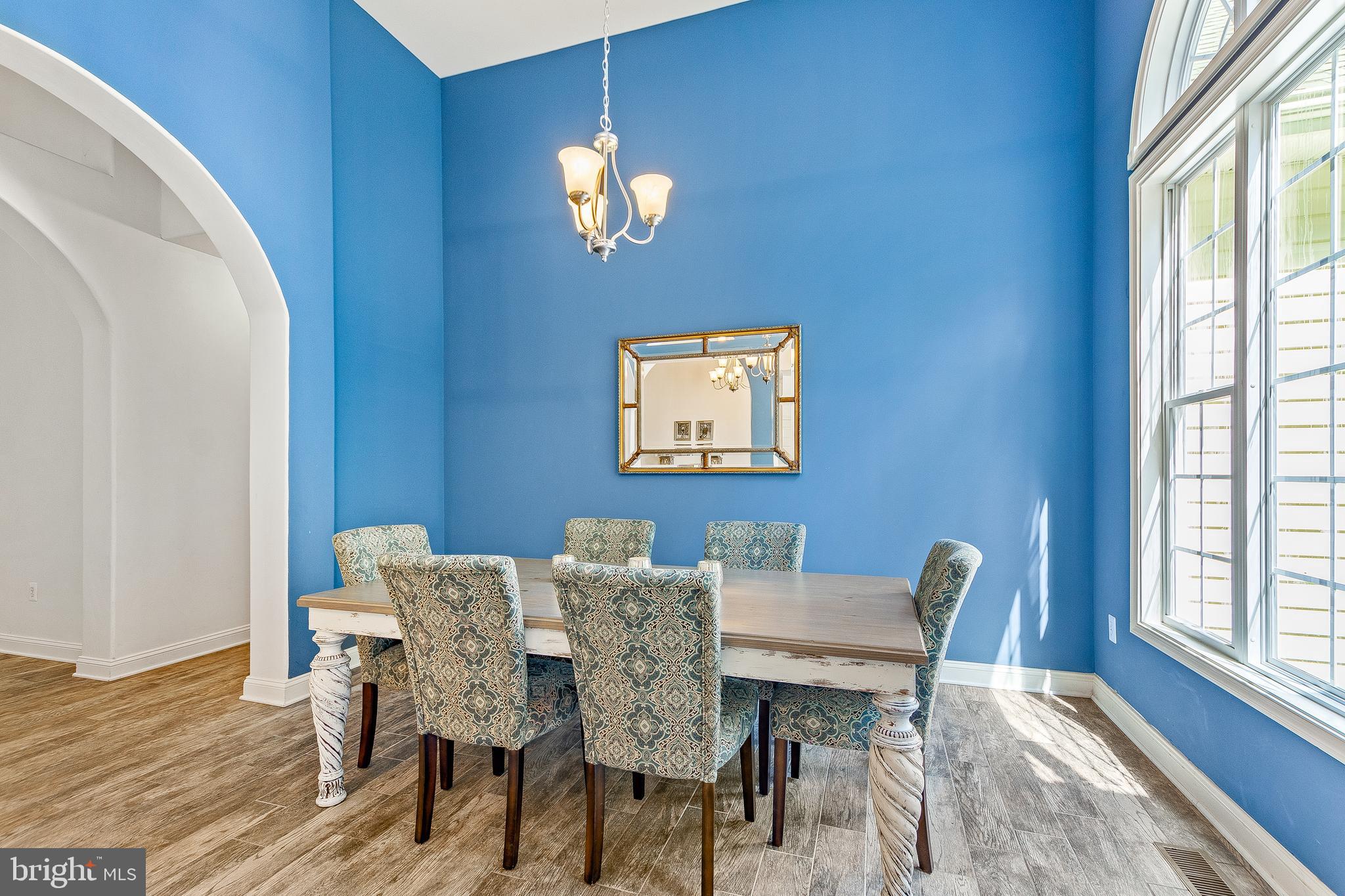 1808 Wilson Road Huntingtown, MD 20639 - Photo 6 of 53 a view of a dining room with furniture and wooden floor