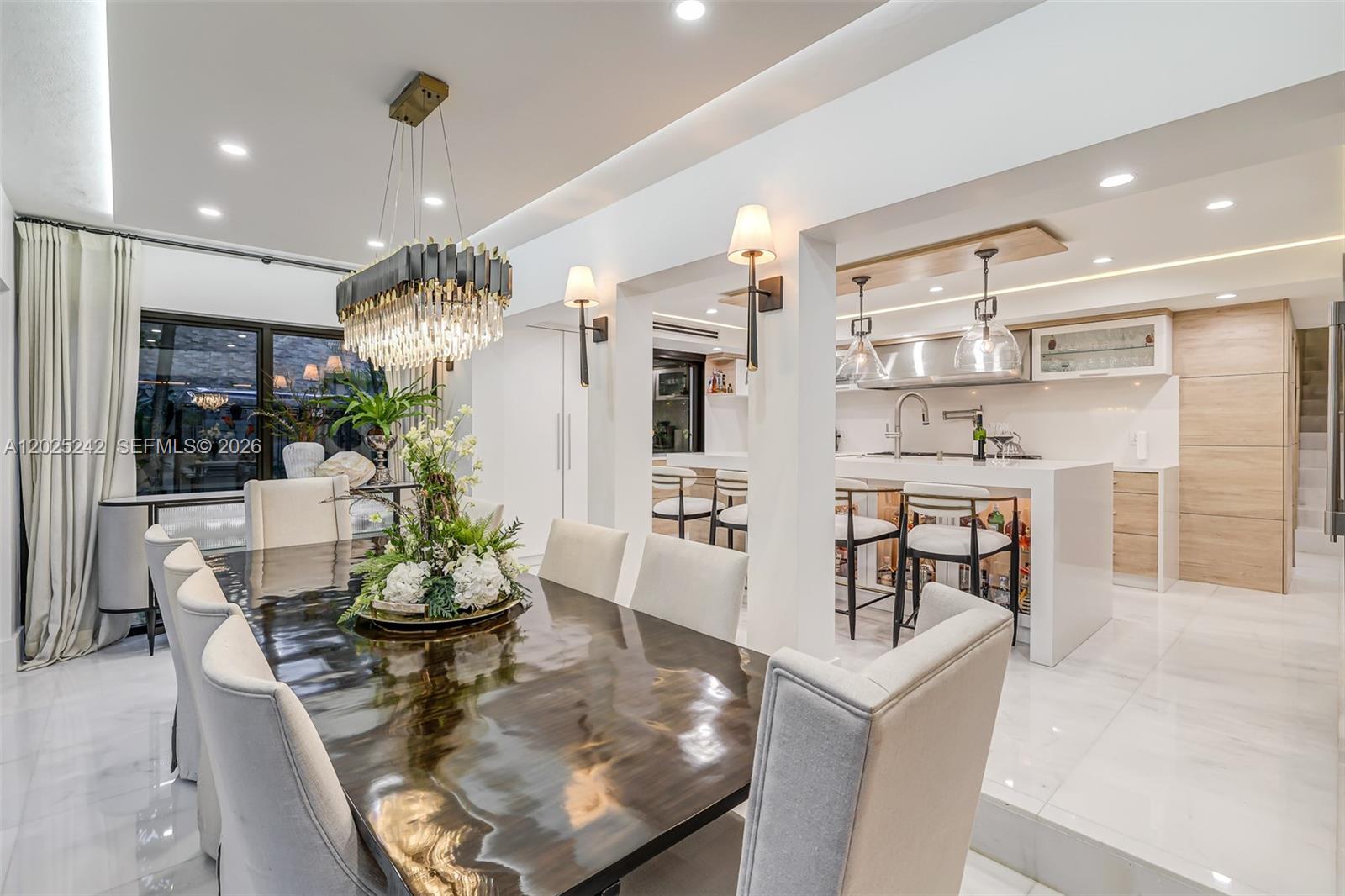 8761 Southwest 56th Street Miami, FL 33165 - Photo 24 of 90 a living room with dining room and kitchen view