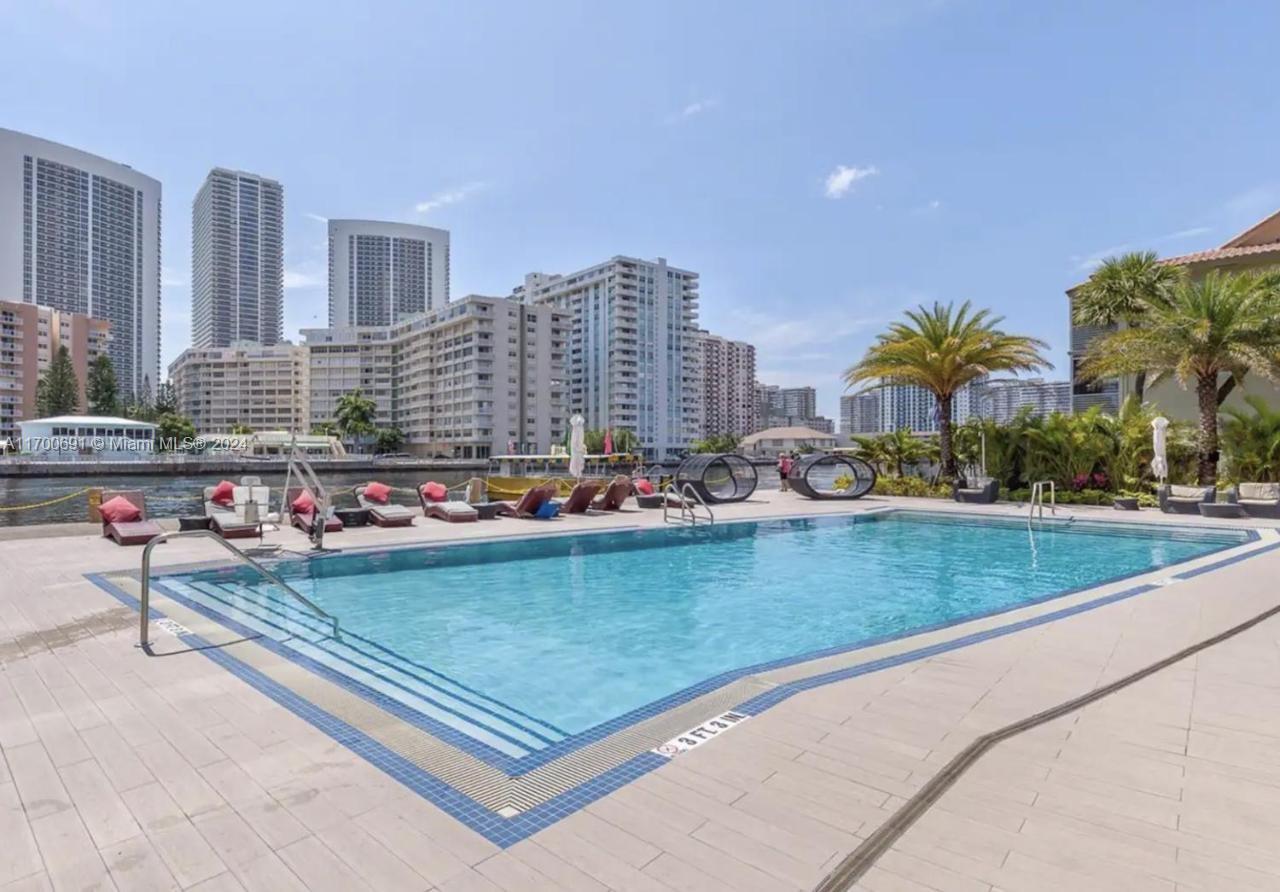 2602 East Hallandale Beach Boulevard, Unit R508 Hallandale Beach, FL 33009 - Photo 22 of 43 a view of swimming pool from a terrace