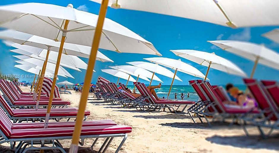 2602 East Hallandale Beach Boulevard, Unit R508 Hallandale Beach, FL 33009 - Photo 43 of 43 a view of an chairs and table in the patio