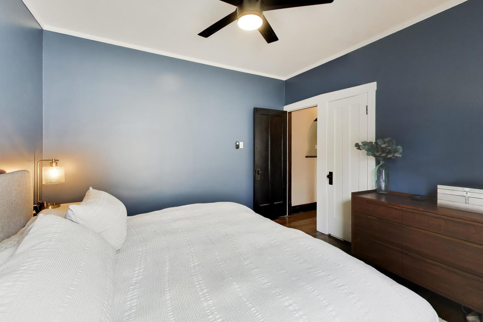 6101 West Patterson Avenue Chicago, IL 60634 - Photo 14 of 40 a bedroom with a bed and a dresser