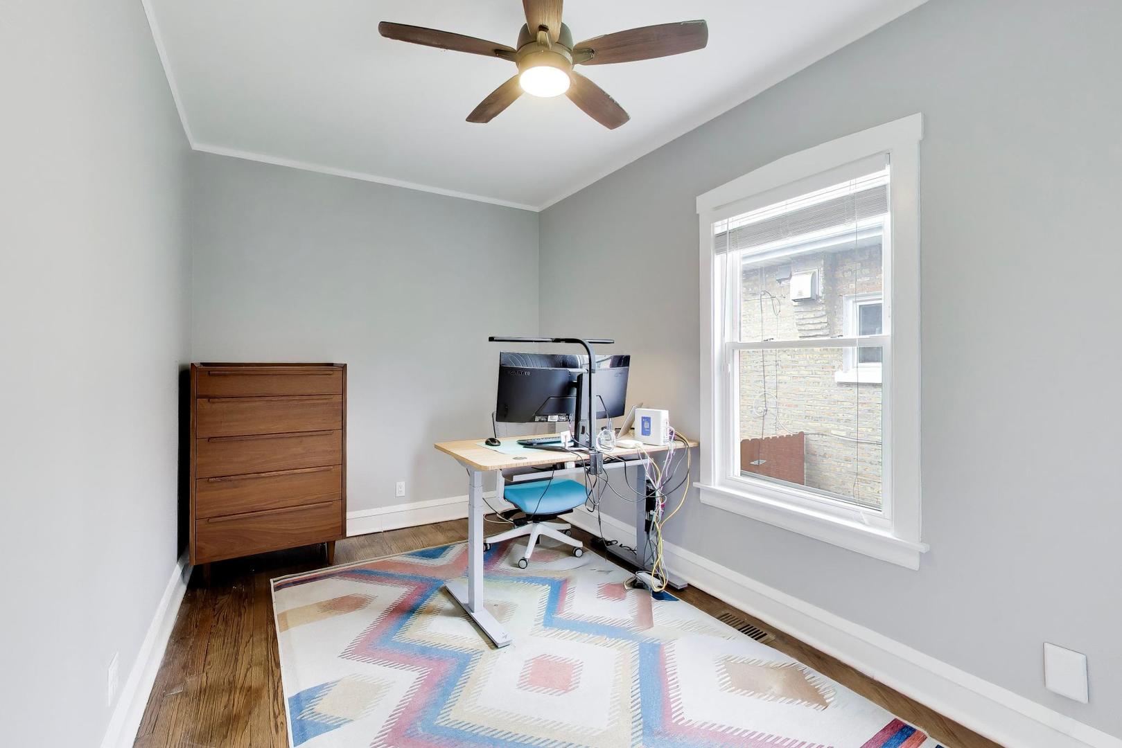 6101 West Patterson Avenue Chicago, IL 60634 - Photo 15 of 40 a workspace with a desk and a window