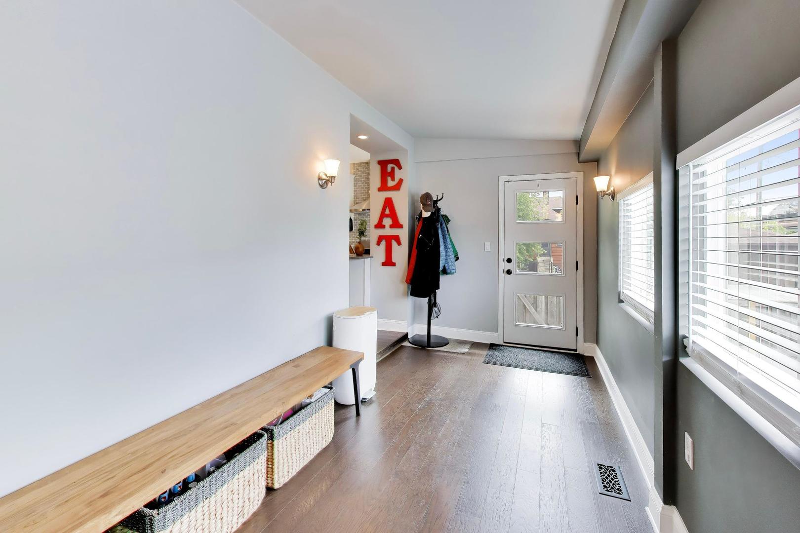 6101 West Patterson Avenue Chicago, IL 60634 - Photo 17 of 40 a view of hallway with wooden floor